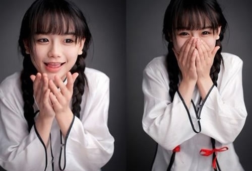南笙姑娘：南笙在豆瓣網(wǎng)上傳她自己的一系列復(fù)古照片，憑借長(zhǎng)著一張?zhí)鹈赖耐仯駠鴮W(xué)生裝扮，梳著兩條可愛的辮子，萌到不行的清純形象，成為宅男新一代時(shí)尚女神。
